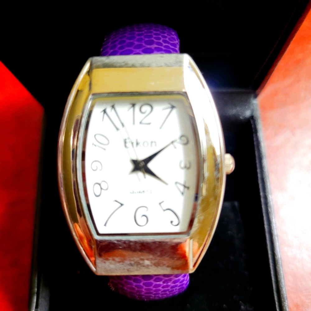 Watch with Spring attachment to timepiece